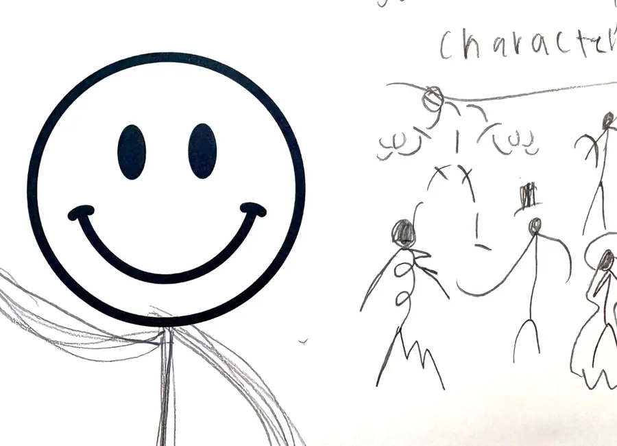 A student's drawings of a smiling character and other imagined characters